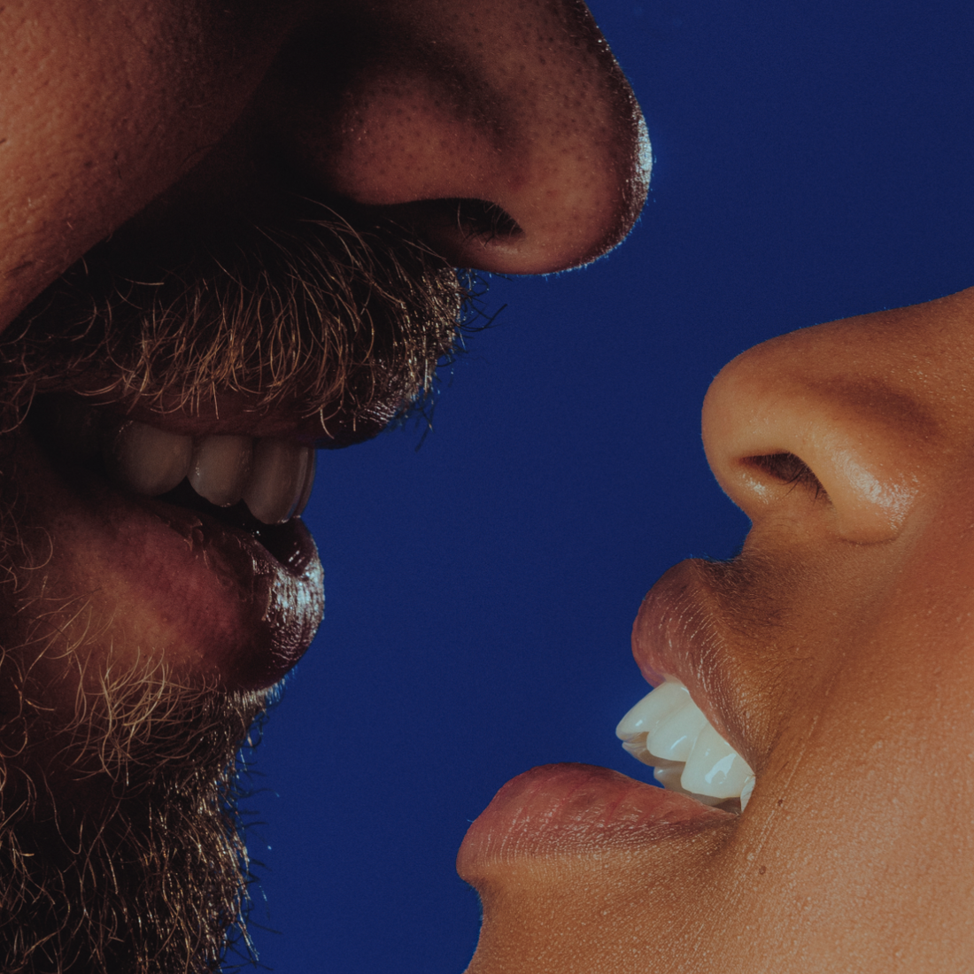 two open mouths moving near each other